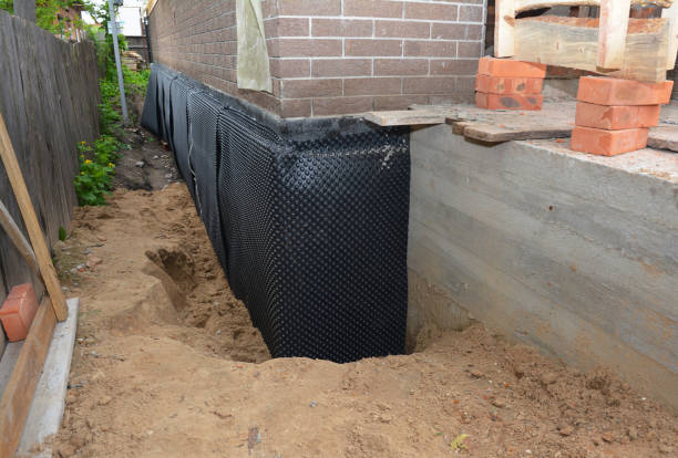 SJ Waterproofing Pros technician performing targeted Foundation Crack Repair assessment in Rushford, MN